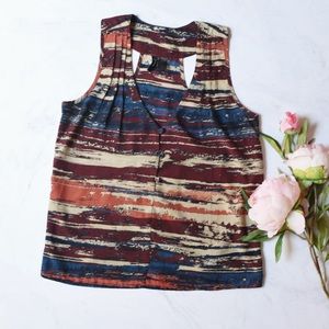 Sleeveless button watercolor top XS fit but M tag